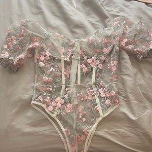 Sheer flower bodysuit with puffy sleeves